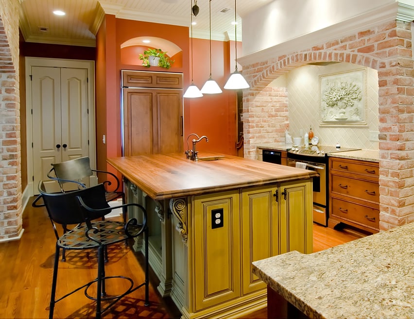 Butcher block kitchen island and eat in area