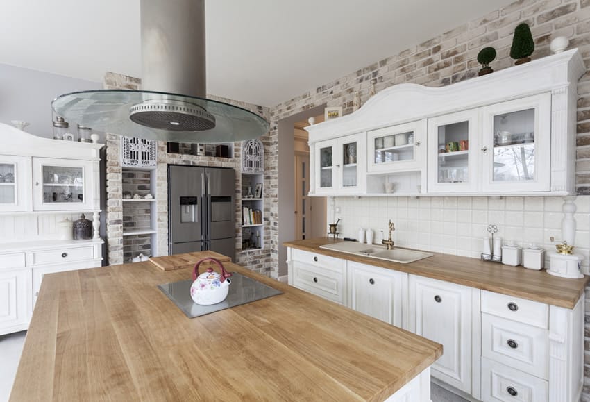 Faux masonry finished walls and oak block countertop