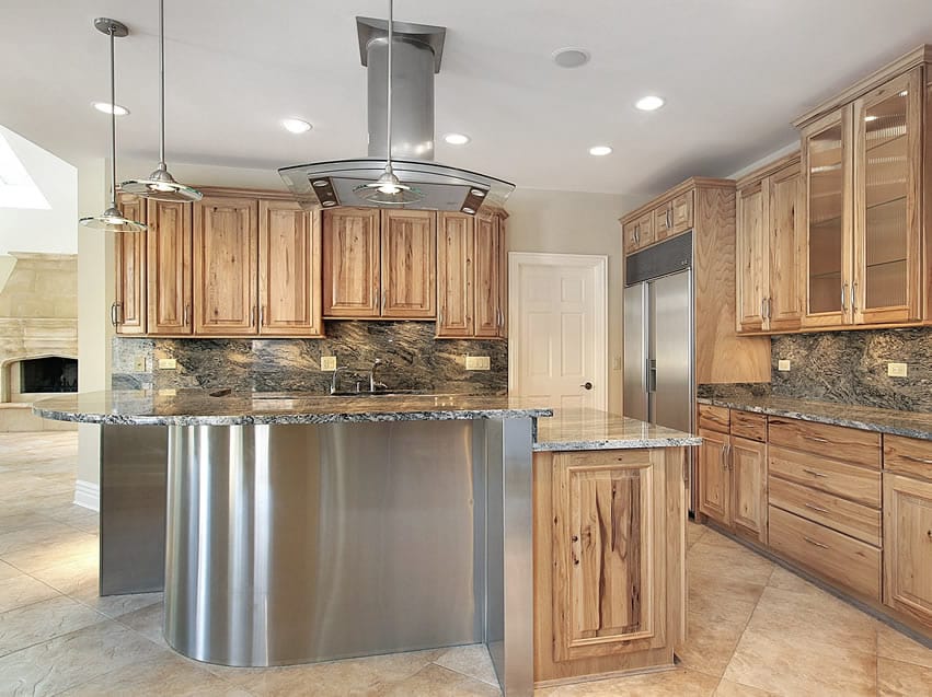 Curved granite kitchen island in luxury home