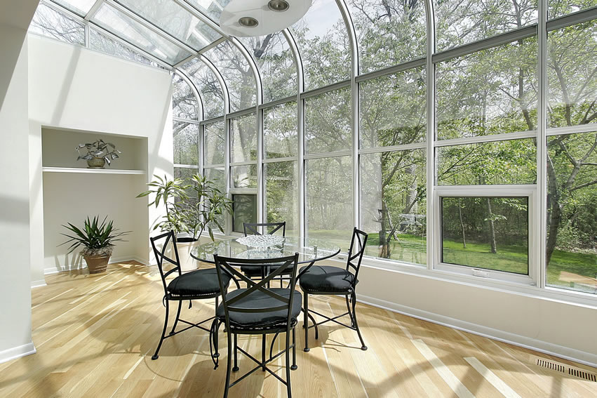 Glass sun room with nature view