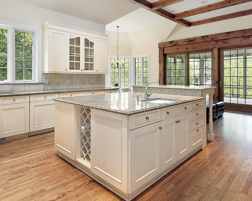 Gray granite and white storage spaces