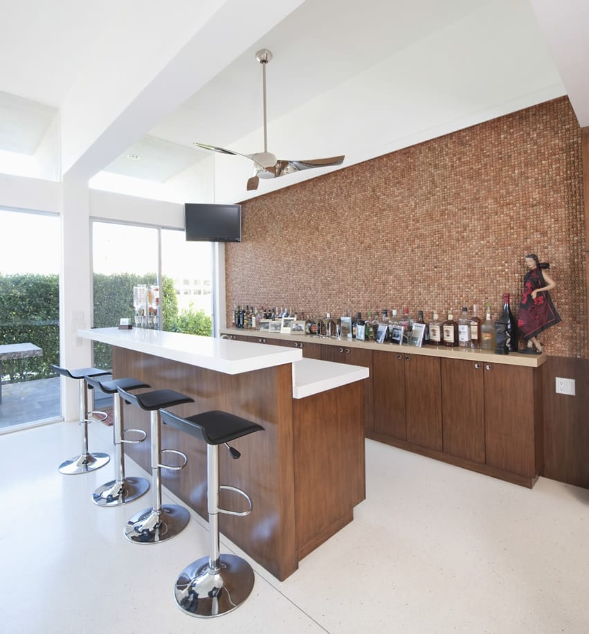 Large home bar with barstool seating