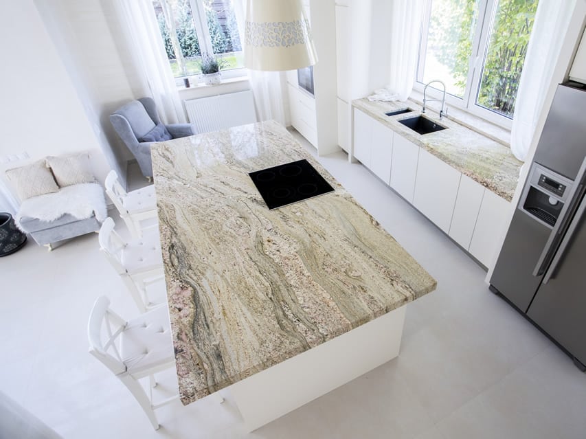 Large white theme kitchen with bar stools