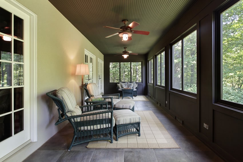 Long sunroom patio with furniture