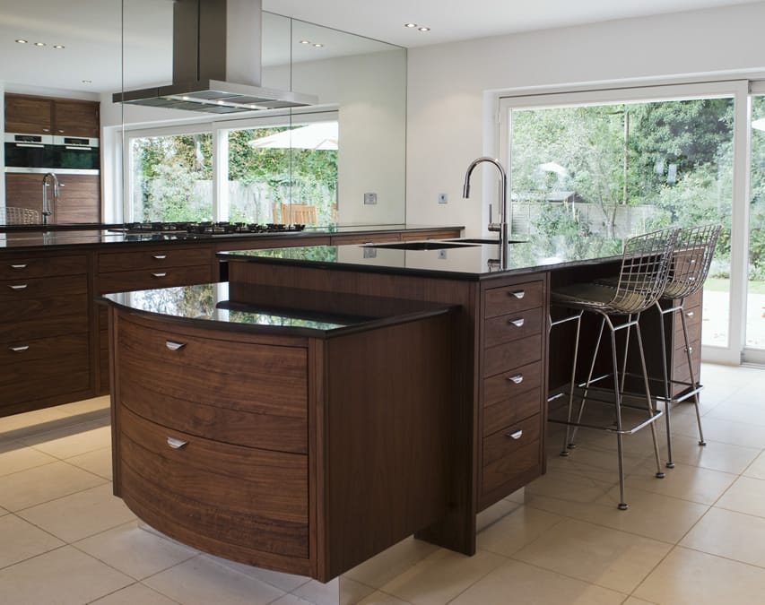 Mirror panels, mahogany laminated wood cabinets and steel bar chairs