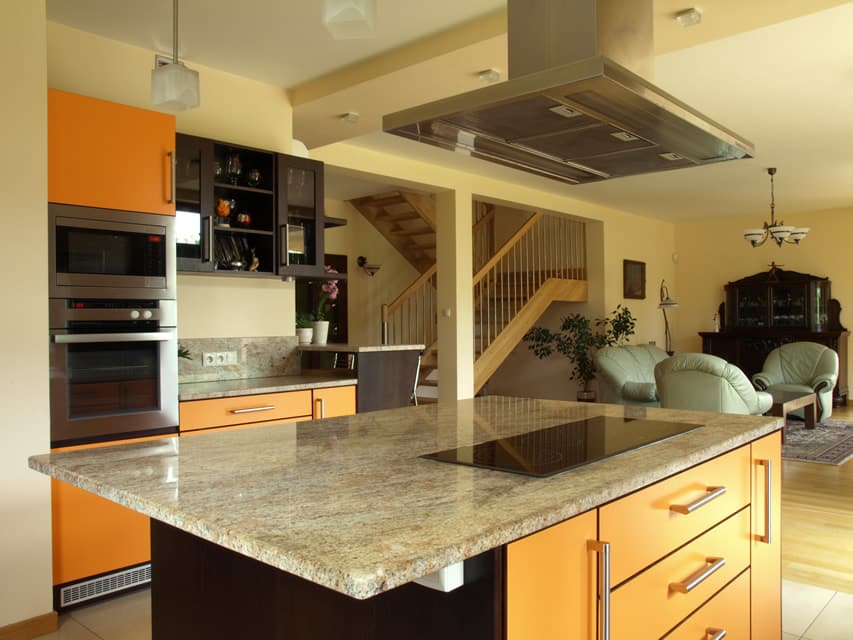 Modern design kitchen island with cook top and stainless oven hood