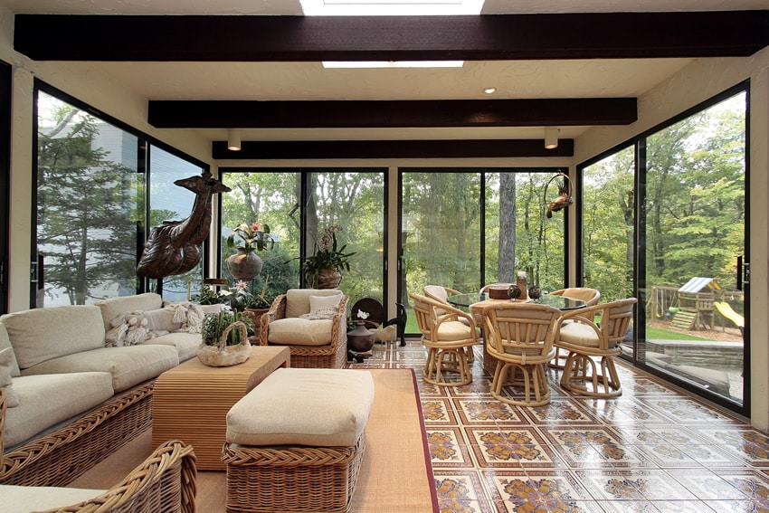Sun room with view of forest