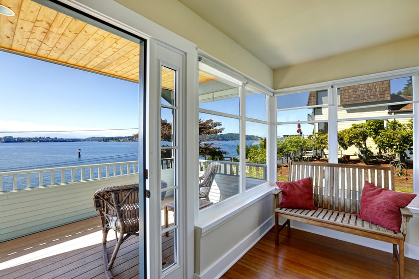 Sunroom with deck and bay view