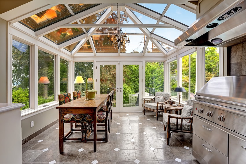 Sunroom with glass ceiling and walls