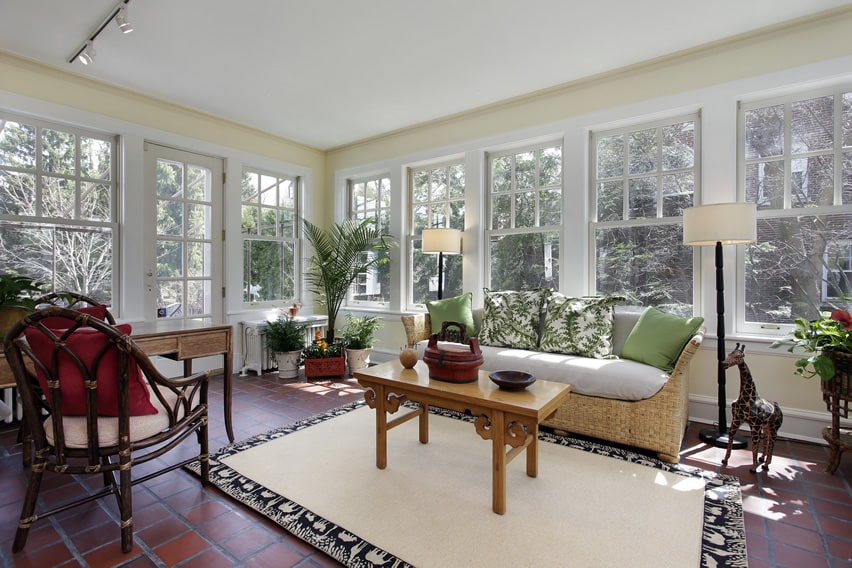 Sunroom with view of trees