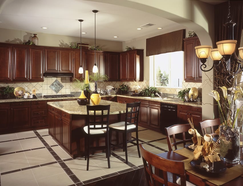 Kitchen with mahogany stained island base and cabinets