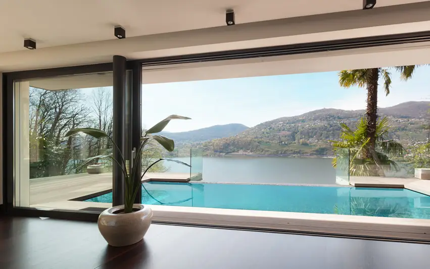 Beautiful infinity pool at home with lake view