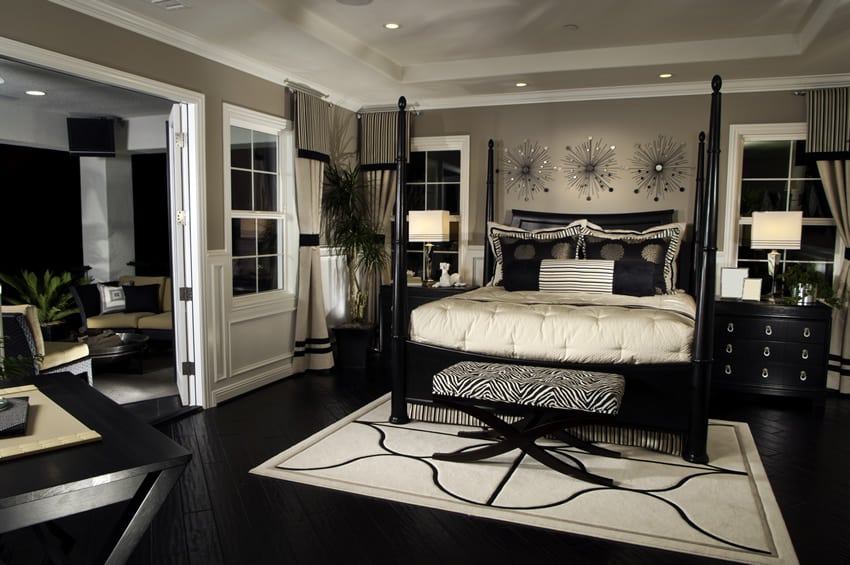 Black and white theme bedroom with sitting area