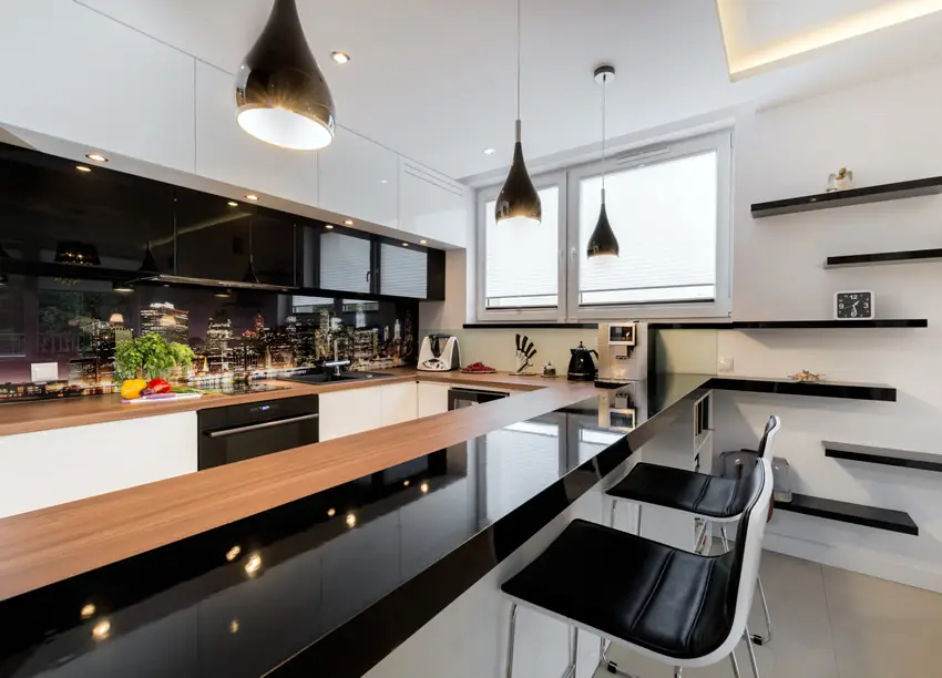 Black modern kitchen with cityscape print back splash
