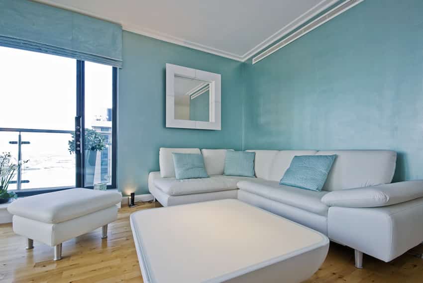 Room with blue walls and shades