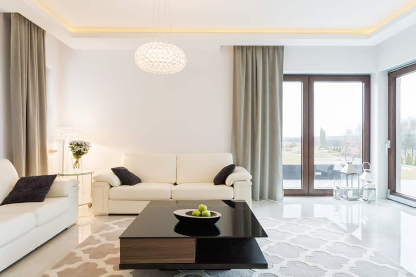 Bright white living room with modern lighting