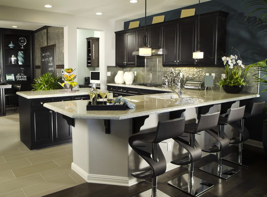 Kitchen with rectangular engineered wood floors and cabinets stained in brown color