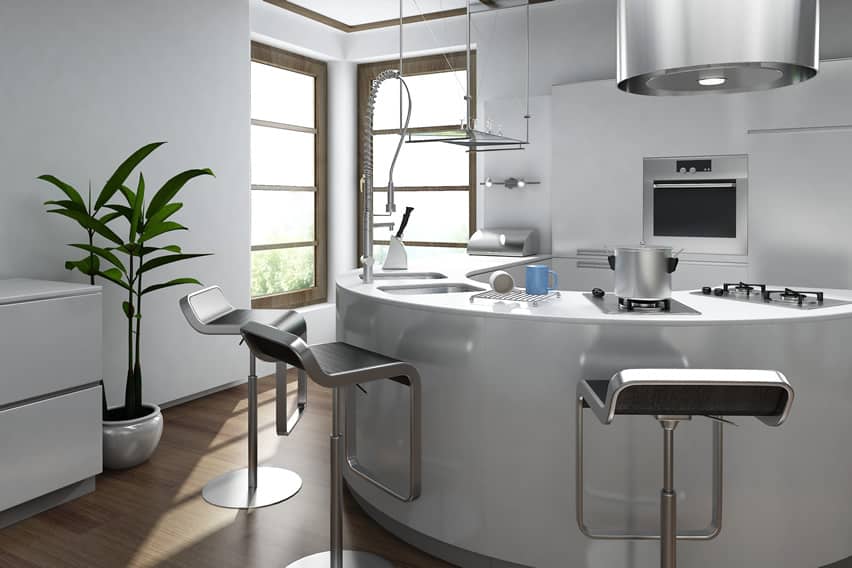 Kitchen with circular layout with stainless bar stools