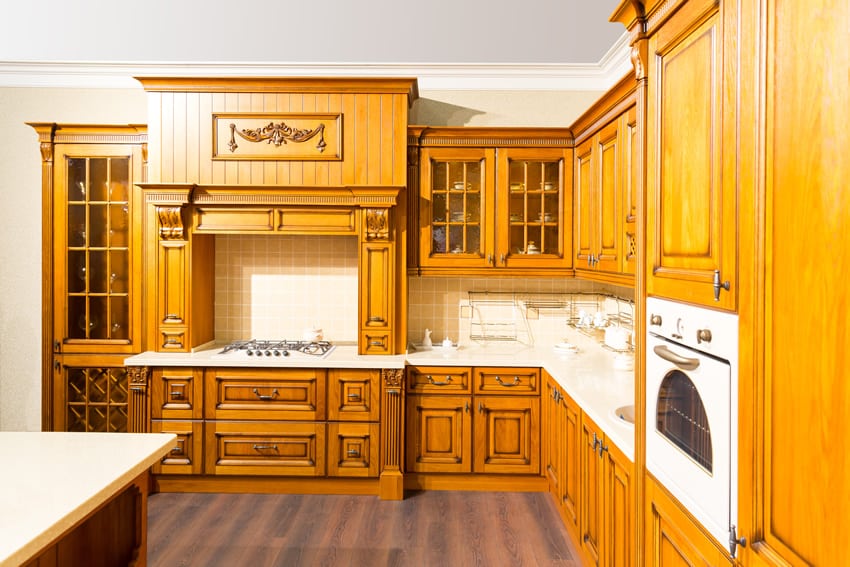 Custom l shaped wood kitchen with decorative design