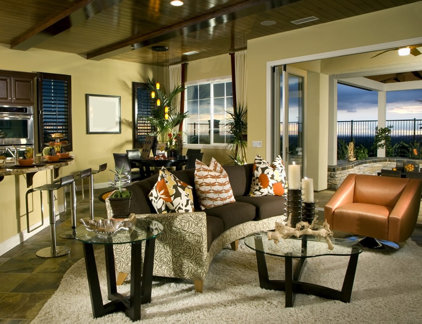 Room with three-seater sofa and beadboard ceiling