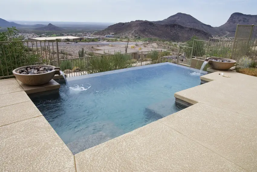 Multi level pool with waterfall feature on two corners