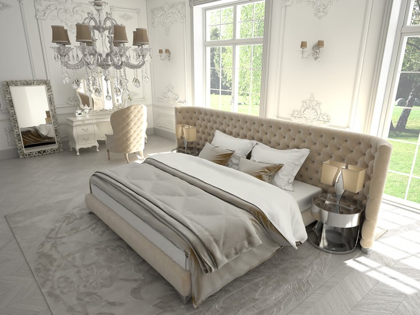 Light glamour bedroom with large custom upholstered headboard