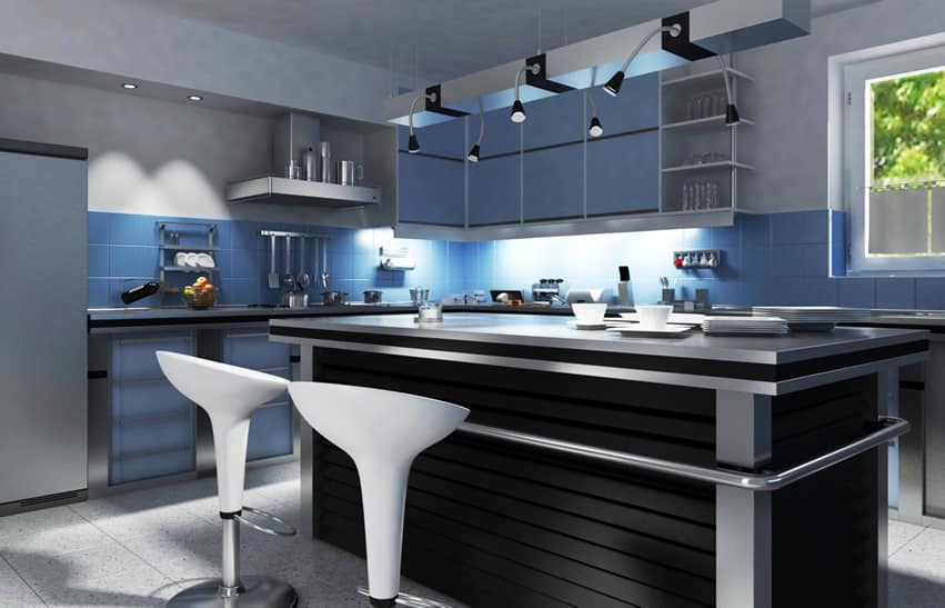 Kitchen with blue, grey and blue color scheme and under cabinet lighting