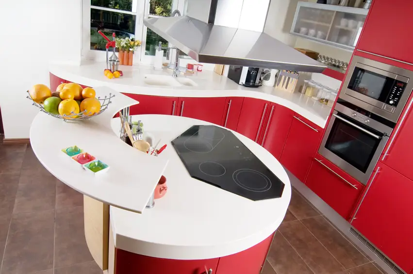 Small curved corner modern kitchen in red