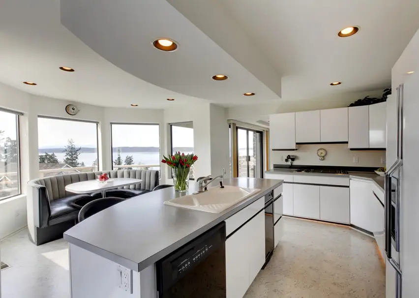 Windowed kitchen with amazing lake view and dining nook