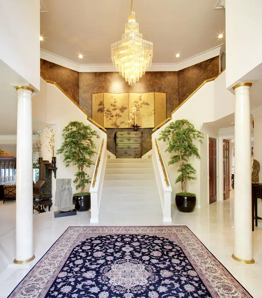 Grand double staircase with Oriental rug