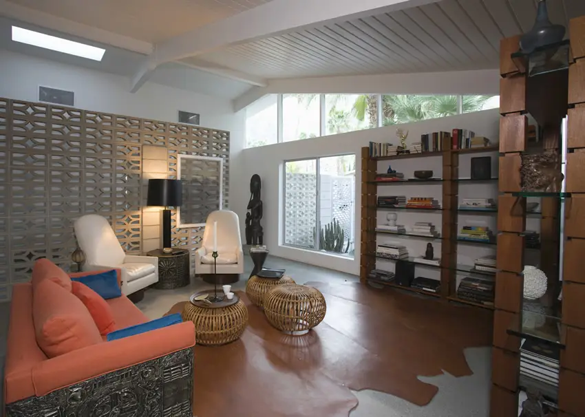 Asian inspired room with light gray divider and shelving