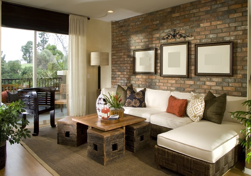Decorated living room with brick accent wall