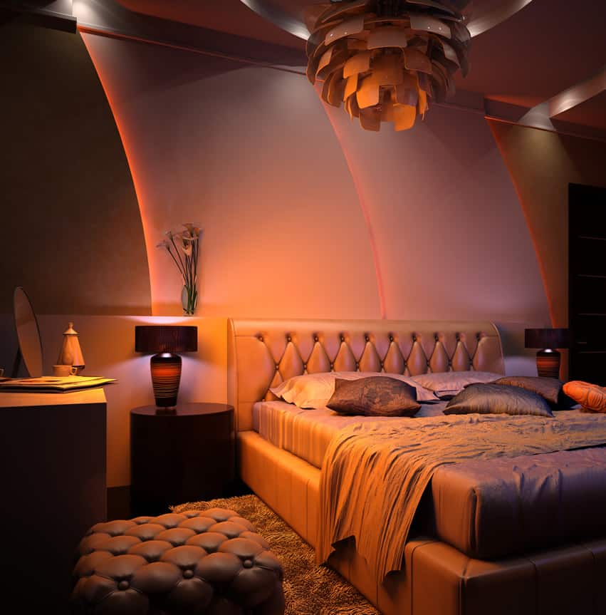 Modern romantic bedroom with leather bedframe and seat
