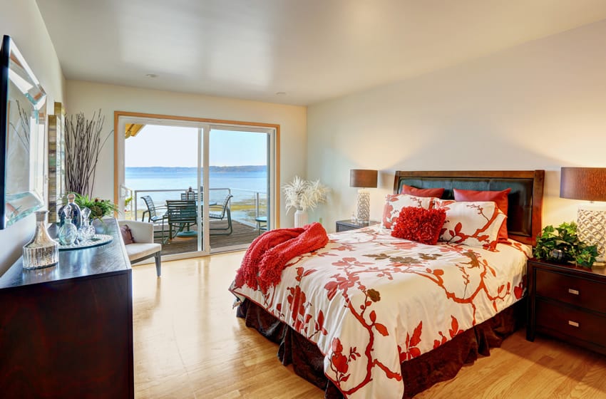 Ocean front bedroom with slider door view and deck
