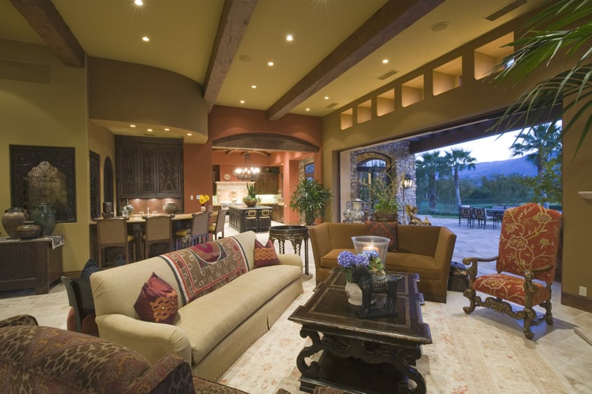 Dark mustard walls, exposed beams with terracotta accent details