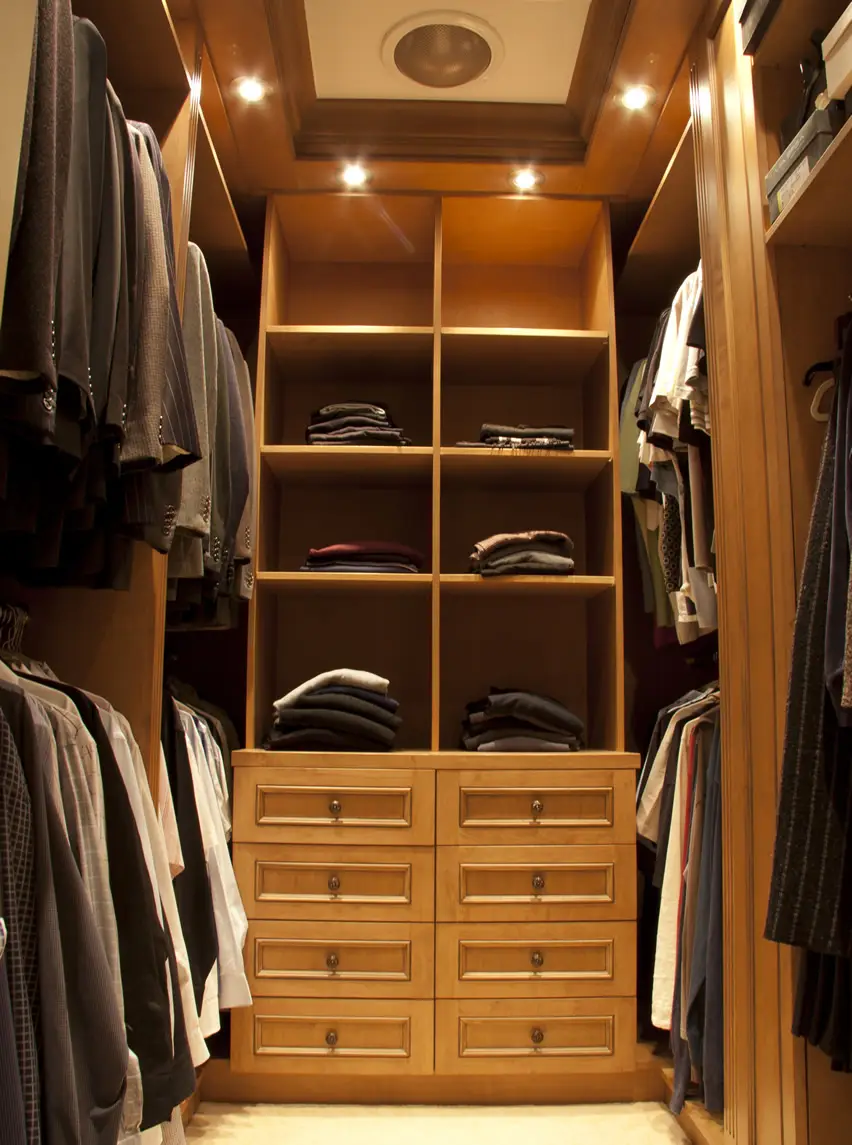 Closet for small space filled with suits
