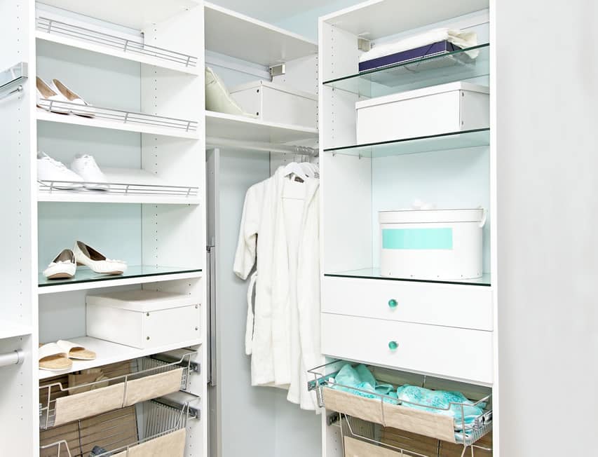 White closet with hangers and shelves