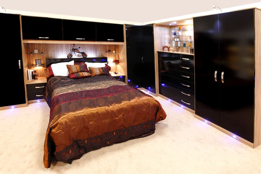 Black modern fitted bedroom with wardrobe and chest of drawers