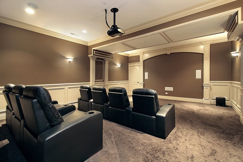 Home theater with black leather seats