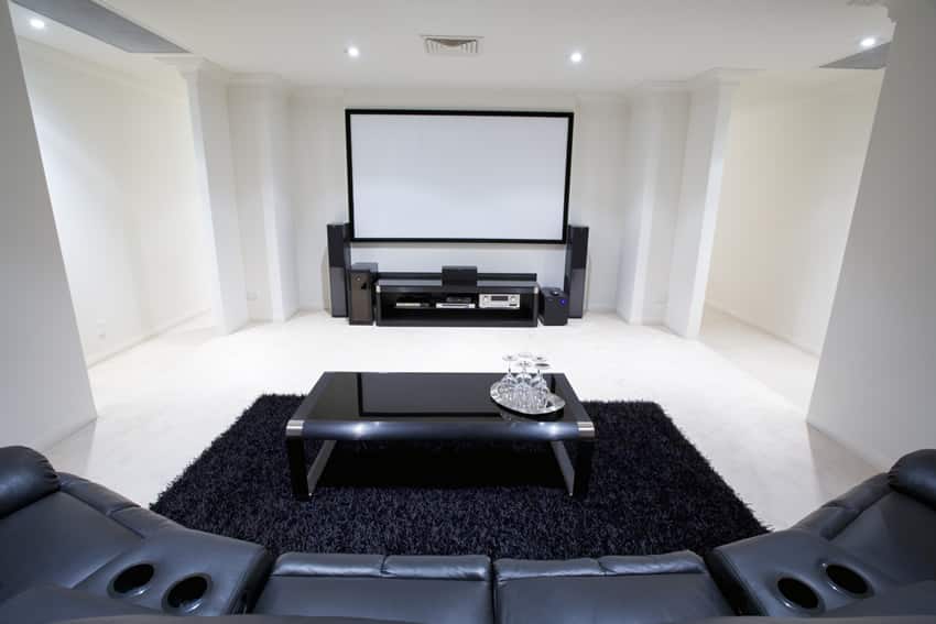Modern media room with movie screen