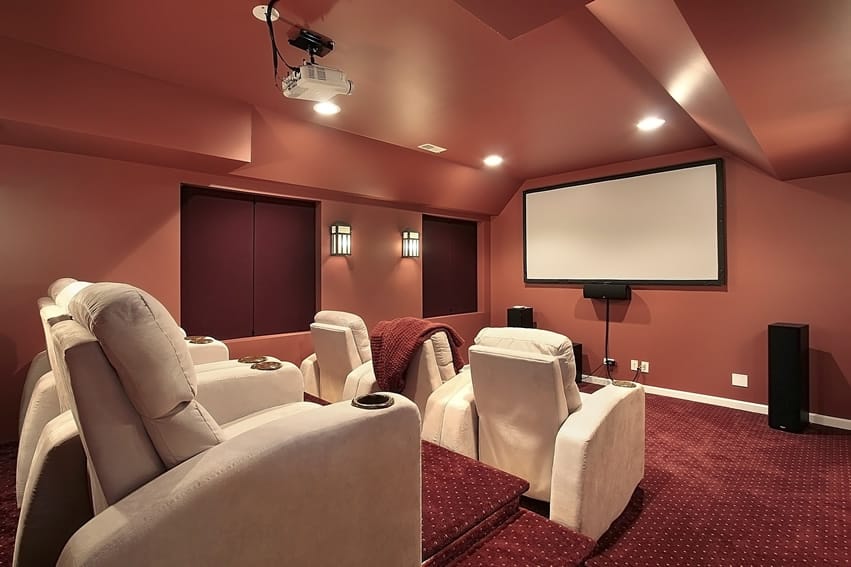 Movie room with white reclining chairs