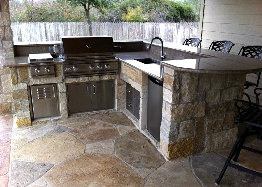 Small outdoor kitchen with granite countertops