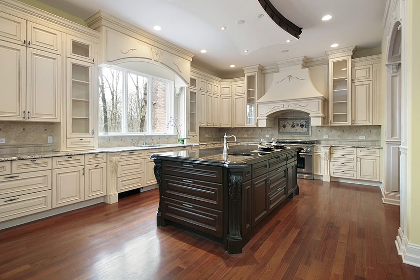 Beautiful white cabinet kitchen with large dark wood island