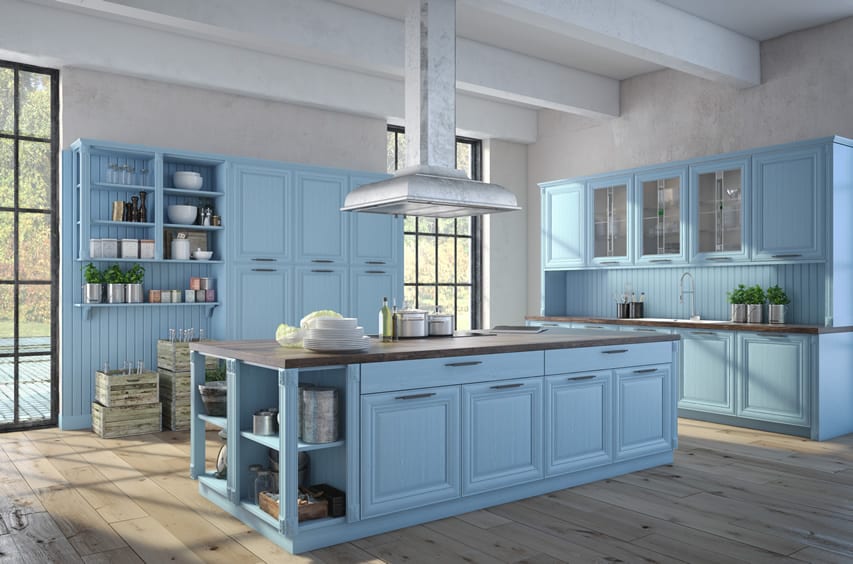 Baby blue color country kitchen with wood flooring
