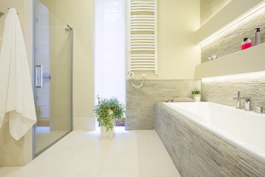 Clean and bright bathroom design with light yellow paint