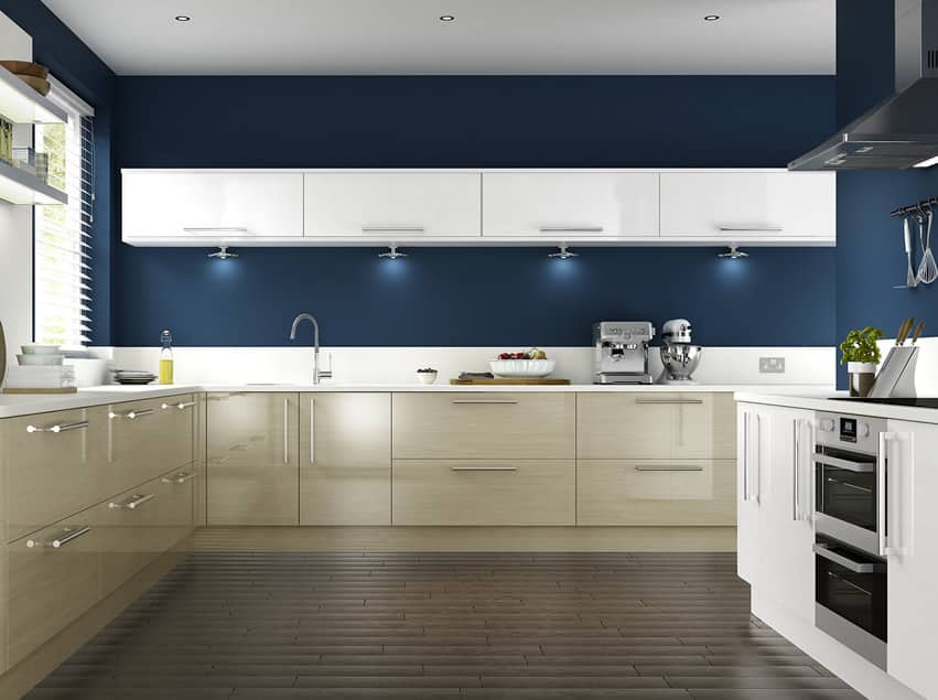 Dark blue painted kitchen with cream cabinets and modern design