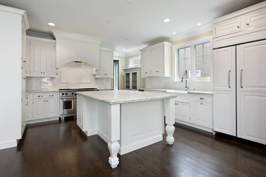 Luxury white kitchen with large custom island