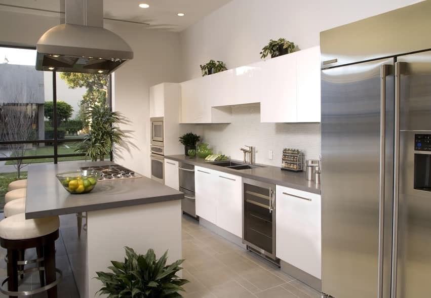Modern white kitchen with grey countertops