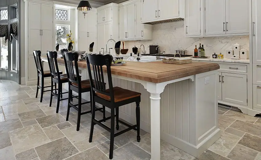 Kitchen in luxury home with wood counter island