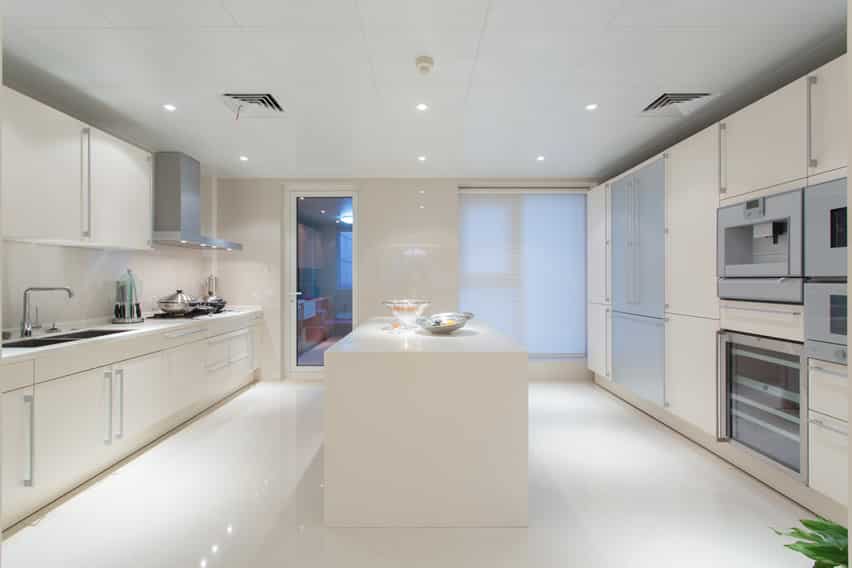Stylish white modern kitchen with island